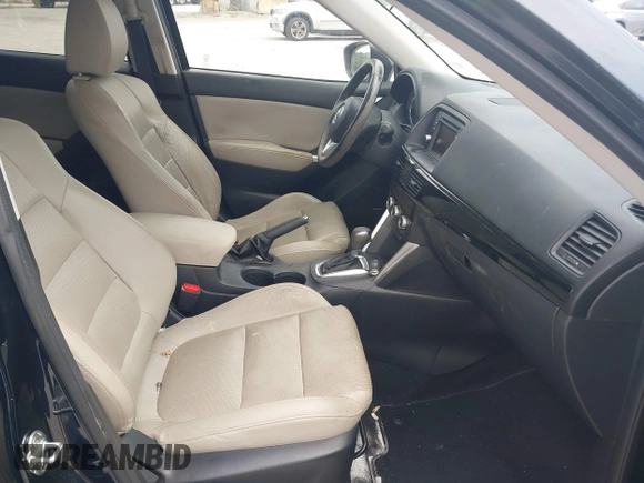 2014 Mazda CX-5 Grand Touring with VIN JM3KE2DY8E0425258, listed as a IAAI auction lot 42179452 with 132,137 mi miles. Bid and sale history available at carsss.com. Image 5.