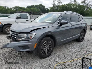 2018 Volkswagen Tiguan SEL with VIN 3VV3B7AXXJM103860, listed as a Copart auction lot 56324035 with 115,770 mi miles and Salvage title. Bid and sale history available at DreamBid. Image 1.