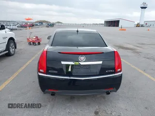 2008 Cadillac CTS AWD w/1SA with VIN 1G6DG577080180639, listed as a IAAI auction lot 42128238 with 141,133 mi miles. Bid and sale history available at carsss.com. Image 6.