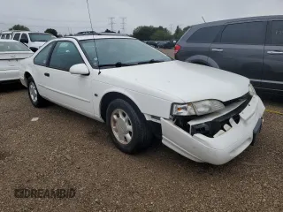 1994 Ford Thunderbird LX with VIN 1FALP62W5RH211700, listed as a Copart auction lot 72046634 with 61,570 mi miles and Salvage Title. Bid and sale history available at DreamBid. Image 4.
