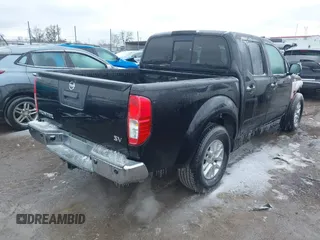 2014 Nissan Frontier SV with VIN 1N6AD0ER5EN746404, listed as a IAAI auction lot 41465263 with 113,465 mi miles and . Bid and sale history available at DreamBid. Image 4.