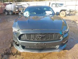 2016 Ford Mustang EcoBoost z VIN 1FA6P8TH1G5290015, wystawiony jako IAAI lot #41011870 z przebiegiem 97 547 mil mil oraz . Historia ofert i sprzedaży dostępna na DreamBid. Obrazek 12.