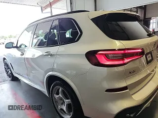 2023 BMW X5 xDrive40i with VIN 5UXCR6C00P9R65110, listed as a IAAI auction lot 42635441 with 32,227 mi miles and . Bid and sale history available at DreamBid. Image 10.