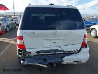 2004 Mercedes-Benz M-Class 3.5L with VIN 4JGAB57E54A482716, listed as a IAAI auction lot 40731487 with 178,587 mi miles. Bid and sale history available at carsss.com. Image 6.