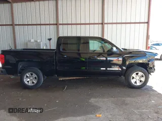 2017 Chevrolet Silverado 1500 LT with VIN 3GCPCREH3HG104014, listed as a IAAI auction lot 41986826 with 58,780 mi miles and . Bid and sale history available at DreamBid. Image 13.