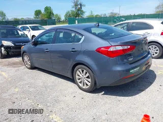 2015 Kia Forte EX with VIN KNAFX4A86F5262650, listed as a IAAI auction lot 42142228 with 170,583 mi miles. Bid and sale history available at carsss.com. Image 3.