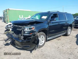 2019 Chevrolet Suburban LS with VIN 1GNSKGKC2KR353977, listed as a IAAI auction lot 42129814 with 85,454 mi miles and . Bid and sale history available at DreamBid. Image 2.