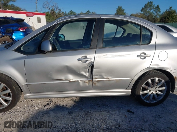 2010 Suzuki SX4 with VIN JS2YC5A46A6310134, listed as a IAAI auction lot 41696108 with 147,059 mi miles and . Bid and sale history available at DreamBid. Image 6.
