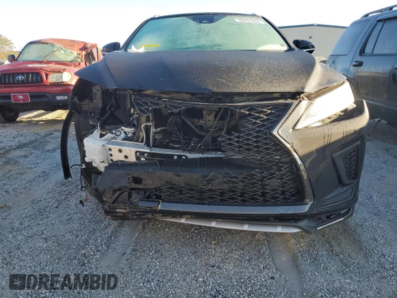 2021 Lexus RX with VIN 2T2YZMDA6MC302127, listed as a Copart auction lot 76701064 with 16,725 mi miles and Salvage Title. Bid and sale history available at carsss.com. Image 5.