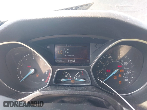 2015 Ford Focus SE z VIN 1FADP3F25FL284097, wystawiony jako IAAI lot #42553323 z przebiegiem 139 647 mil mil oraz . Historia ofert i sprzedaży dostępna na DreamBid. Obrazek 7.