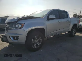 2015 Chevrolet Colorado 4WD Z71 with VIN 1GCGTCE36F1273697, listed as a Copart auction lot 63602685 with 151,038 mi miles and Salvage title. Bid and sale history available at DreamBid. Image 1.