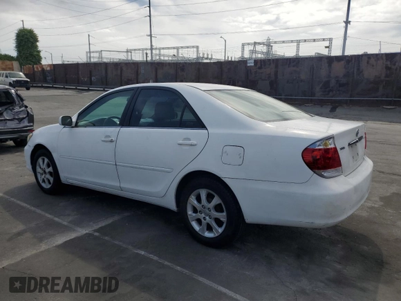 2004 Toyota Camry LE with VIN 4T1BE32KX4U379593, listed as a Copart auction lot 53391455 with 221,056 mi miles and Salvage Title. Bid and sale history available at carsss.com. Image 2.