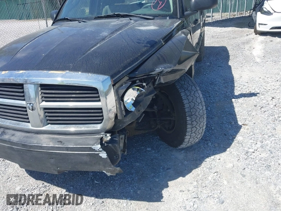 2006 Dodge Dakota SLT with VIN 1D7HE42KX6S714022, listed as a IAAI auction lot 41773416 with 197,196 mi miles and . Bid and sale history available at carsss.com. Image 6.