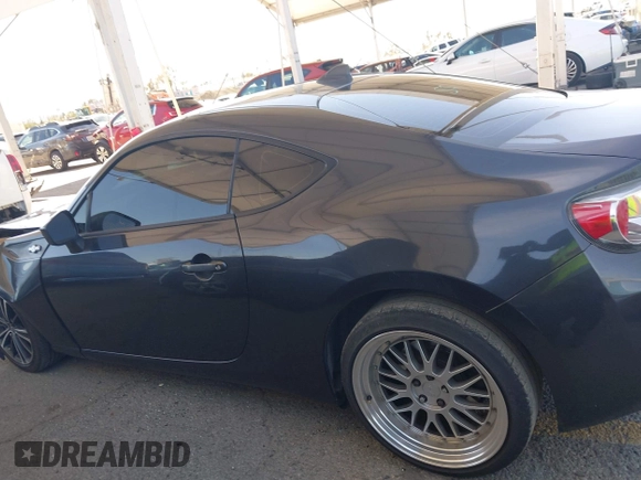 2016 Scion FR-S with VIN JF1ZNAA15G8703553, listed as a IAAI auction lot 41839670 with 73,538 mi miles. Bid and sale history available at carsss.com. Image 14.