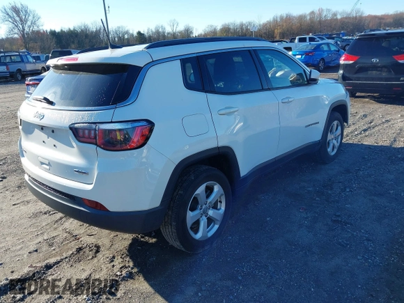 2020 Jeep Compass Latitude with VIN 3C4NJDBB2LT115599, listed as a IAAI auction lot 40970548 with 63,349 mi miles. Bid and sale history available at carsss.com. Image 4.