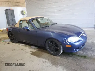 2001 Mazda MX-5 Miata with VIN JM1NB353510209224, listed as a Copart auction lot 51736955 with 103,732 mi miles and Salvage Title. Bid and sale history available at DreamBid. Image 4.