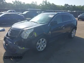 2014 Cadillac SRX Performance Collection with VIN 3GYFNCE39ES613051, listed as a IAAI auction lot 42113063 with 82,952 mi miles and . Bid and sale history available at carsss.com. Image 17.
