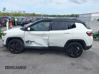 2018 Jeep Compass Latitude with VIN 3C4NJCBB1JT408465, listed as a IAAI auction lot 41350902 with 79,565 mi miles and . Bid and sale history available at DreamBid. Image 14.