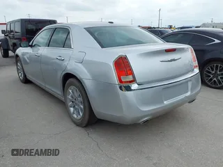 2012 Chrysler 300 Limited with VIN 2C3CCACG9CH223032, listed as a IAAI auction lot 42144147 with 139,625 mi miles. Bid and sale history available at carsss.com. Image 3.