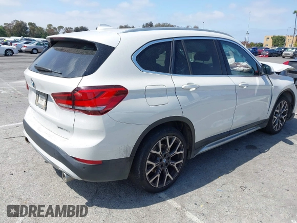 2020 BMW X1 xDrive28i with VIN WBXJG9C04L5R18165, listed as a IAAI auction lot 42313313 with 46,815 mi miles and . Bid and sale history available at DreamBid. Image 4.