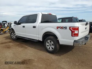 2018 Ford F-150 XL with VIN 1FTEW1E50JFC65370, listed as a Copart auction lot 59222655 with 213,487 mi miles and Salvage title. Bid and sale history available at DreamBid. Image 2.