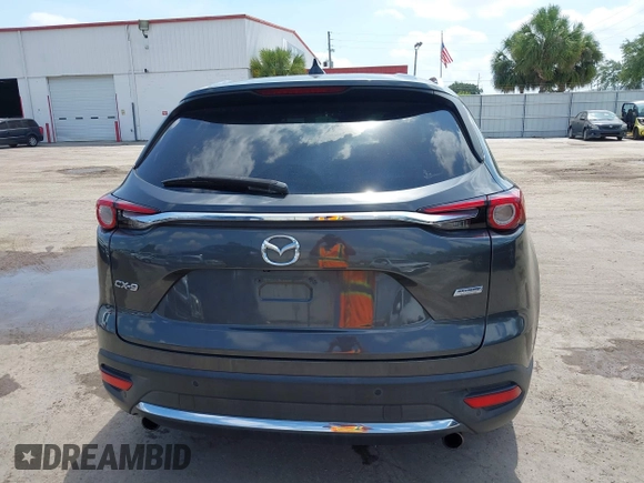 2016 Mazda CX-9 Signature with VIN JM3TCBEY9G0100579, listed as a IAAI auction lot 42282293 with 142,700 mi miles and . Bid and sale history available at DreamBid. Image 16.
