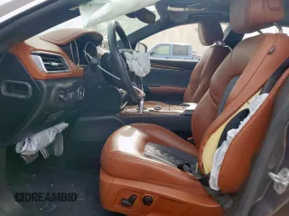 2018 Maserati Ghibli S Q4 GranLusso z VIN ZAM57YTL8J1265648, wystawiony jako Copart lot #56295795 z przebiegiem 51 857 mil mil oraz Szkoda całkowita • Salvage title. Historia ofert i sprzedaży dostępna na DreamBid. Obrazek 7.