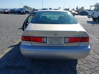 2001 Toyota Camry CE with VIN JT2BG22KX10559757, listed as a IAAI auction lot 41823719 with 72,775 mi miles. Bid and sale history available at carsss.com. Image 16.