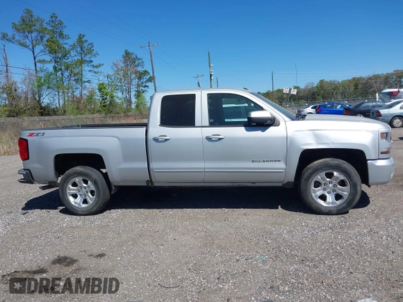 2018 Chevrolet Silverado 1500 LT with VIN 1GCVKREC9JZ335603, listed as a IAAI auction lot 41853399 with 152,460 mi miles and . Bid and sale history available at DreamBid. Image 13.
