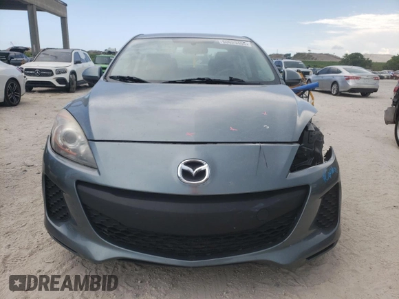 2013 Mazda 3 i SV z VIN JM1BL1TFXD1804831, wystawiony jako Copart lot #60029405 z przebiegiem 83 633 mil mil oraz Szkoda całkowita • Salvage title. Historia ofert i sprzedaży dostępna na DreamBid. Obrazek 5.