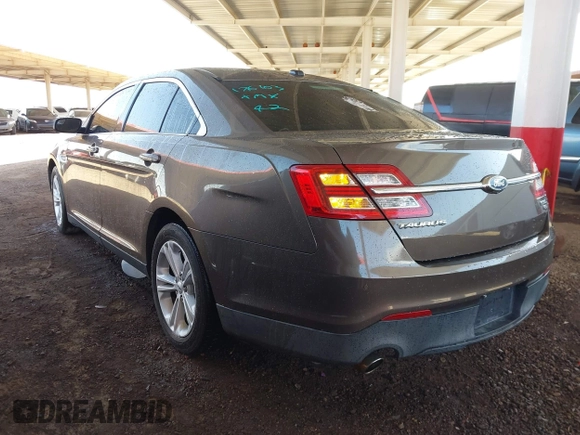 2015 Ford Taurus SEL with VIN 1FAHP2H87FG176103, listed as a IAAI auction lot 41950844 with 205,014 mi miles. Bid and sale history available at carsss.com. Image 3.