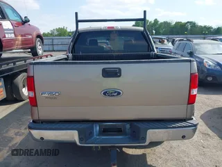 2004 Ford F-150 XLT with VIN 1FTRW12W74KD52290, listed as a IAAI auction lot 42066324 with 252,866 mi miles. Bid and sale history available at carsss.com. Image 16.