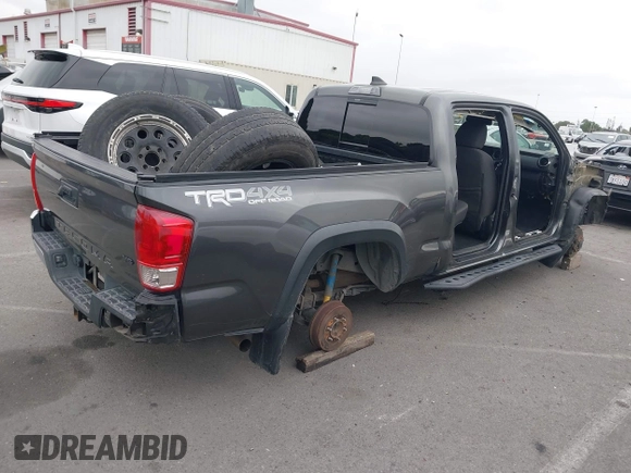 2017 Toyota Tacoma SR5 with VIN 3TMDZ5BN1HM021526, listed as a IAAI auction lot 42204091 with 82,802 mi miles and . Bid and sale history available at DreamBid. Image 4.