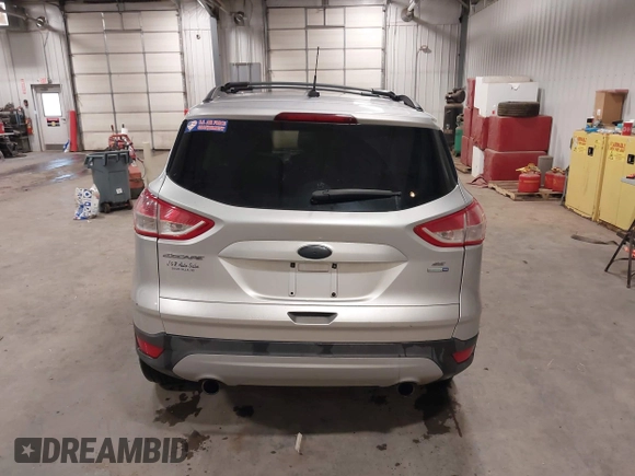2013 Ford Escape SE with VIN 1FMCU9GX7DUB89197, listed as a IAAI auction lot 42311546 with 131,263 mi miles and . Bid and sale history available at DreamBid. Image 17.
