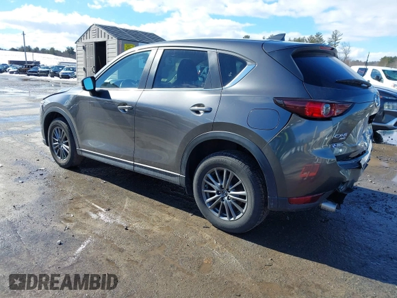2017 Mazda CX-5 Touring with VIN JM3KFBCL3H0214881, listed as a IAAI auction lot 41694560 with 64,609 mi miles. Bid and sale history available at carsss.com. Image 3.