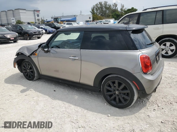 2018 MINI Hardtop Cooper with VIN WMWXP5C56J2H29012, listed as a Copart auction lot 50571595 with 77,129 mi miles and Salvage title. Bid and sale history available at DreamBid. Image 2.