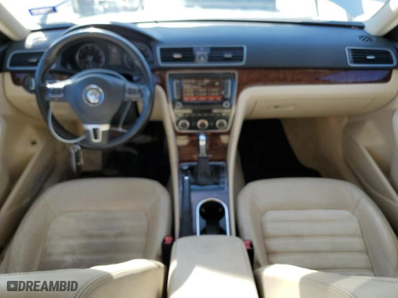 2013 Volkswagen Passat SEL Premium with VIN 1VWCM7A32DC063332, listed as a Copart auction lot 77217544 with 104,534 mi miles and Salvage Title. Bid and sale history available at carsss.com. Image 8.