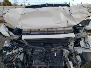 2025 GMC Hummer EV 2X with VIN 1GKB0NDE5SU102096, listed as a Copart auction lot 47083615 with 8,713 mi miles and Salvage Title. Bid and sale history available at carsss.com. Image 12.
