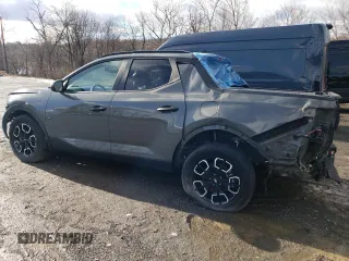 2023 Hyundai Santa Cruz SEL z VIN 5NTJCDAE4PH065039, wystawiony jako Copart lot #58940925 z przebiegiem 18 129 mil mil oraz Szkody całkowita. Historia ofert i sprzedaży dostępna na DreamBid. Obrazek 2.