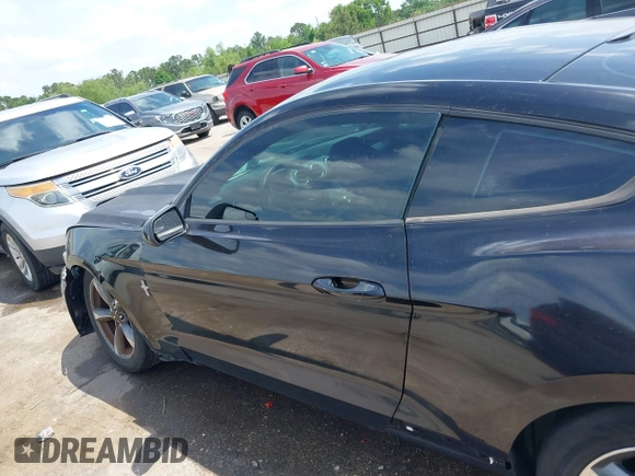 2015 Ford Mustang V6 with VIN 1FA6P8AM3F5392995, listed as a IAAI auction lot 42063188 with 128,854 mi miles and . Bid and sale history available at DreamBid. Image 14.