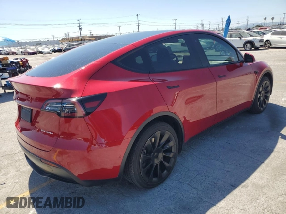 2021 Tesla Model Y Long Range with VIN 5YJYGDEE0MF217761, listed as a Copart auction lot 56525075 with 72,751 mi miles and Salvage Title. Bid and sale history available at DreamBid. Image 3.