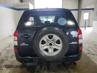 2009 Suzuki Grand Vitara with VIN JS3TE042694100010, listed as a Copart auction lot 56716225 with 148,495 mi miles and Salvage title. Bid and sale history available at DreamBid. Image 6.