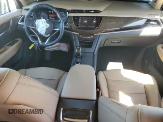 2024 Cadillac XT6 Premium Luxury z VIN 1GYKPERS1RZ755490, wystawiony jako Copart lot #49706575 z przebiegiem 4 239 mil mil oraz Szkoda całkowita • Salvage title. Historia ofert i sprzedaży dostępna na DreamBid. Obrazek 8.
