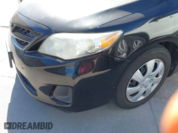 2012 Toyota Corolla L with VIN 5YFBU4EE8CP061390, listed as a IAAI auction lot 41872545 with 104,476 mi miles. Bid and sale history available at carsss.com. Image 6.