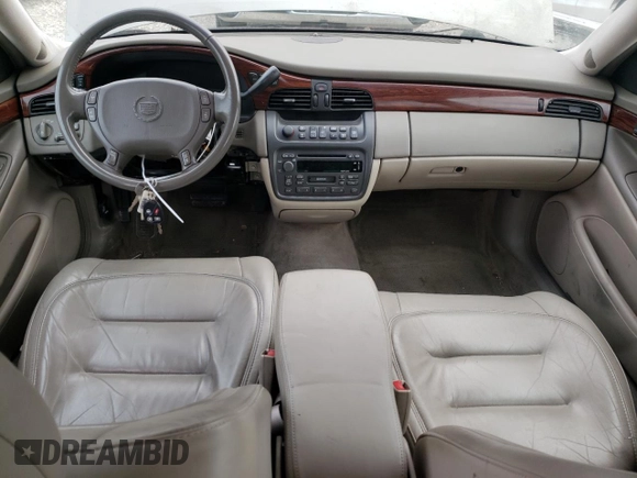 2003 Cadillac DeVille with VIN 1G6KD54Y03U206526, listed as a Copart auction lot 38023213 with 103,724 mi miles and Salvage Title. Bid and sale history available at carsss.com. Image 8.
