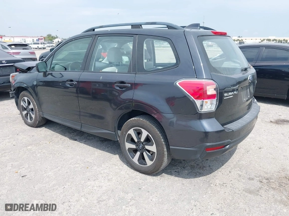 2018 Subaru Forester with VIN JF2SJABC3JH477514, listed as a IAAI auction lot 41880639 with 134,970 mi miles. Bid and sale history available at carsss.com. Image 3.