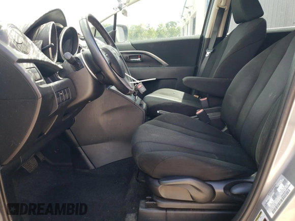 2015 Mazda 5 Touring z VIN JM1CW2CL4F0188463, wystawiony jako Copart lot #57597535 z przebiegiem 159 388 mil mil oraz Szkoda całkowita • Salvage title. Historia ofert i sprzedaży dostępna na DreamBid. Obrazek 7.