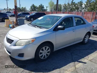 2009 Toyota Corolla with VIN JTDBL40E09J007038, listed as a IAAI auction lot 41830758 with 292,897 mi miles. Bid and sale history available at carsss.com. Image 2.