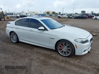 2014 BMW 5 Series 535i with VIN WBA5B1C57ED475753, listed as a IAAI auction lot 42087089 with 95,528 mi miles and . Bid and sale history available at DreamBid. Image 1.