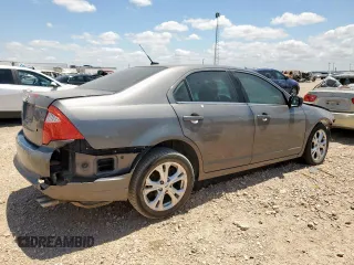 2012 Ford Fusion SE with VIN 3FAHP0HA9CR435931, listed as a Copart auction lot 61633525 with 169,561 mi miles and Salvage title. Bid and sale history available at DreamBid. Image 3.
